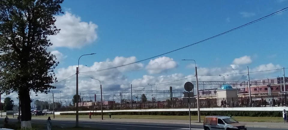 Clouds over the highway Stock Photos