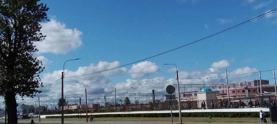 Clouds over the highway Stock Photos