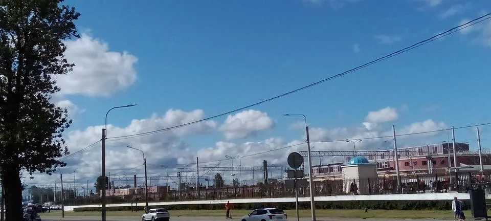 Clouds over the highway Stock Photos