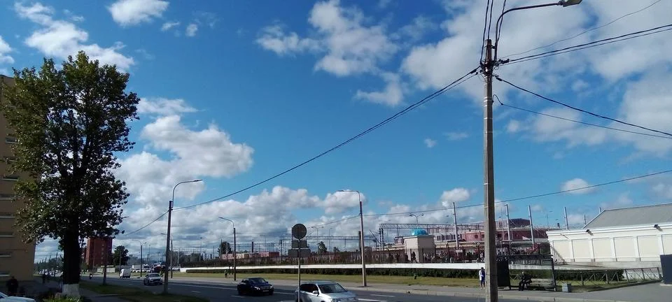 Clouds over the highway Stock Photos