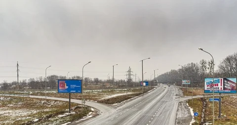 Clouds over highway in timelapse 4K Stock Footage 124579881