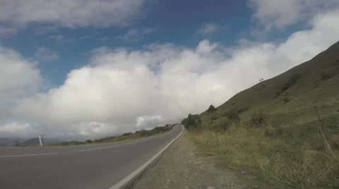 Clouds over highway timelapse Stock Footage 52856037
