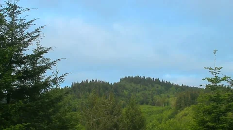 Clouds over a Hill Stock Footage 53342129