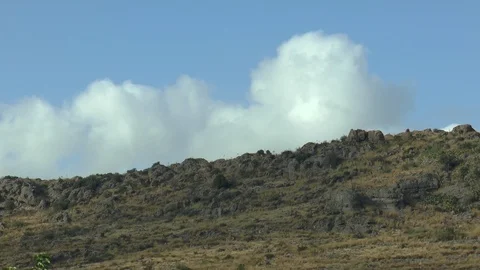 Clouds Over A Hill Stock Footage 127976769