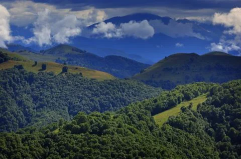 Clouds over the hills in the area of Mount Elbrus. Photographed in the Caucas Stock Photos