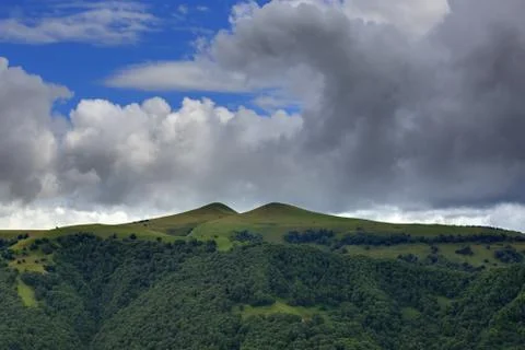 Clouds over the hills in the area of Mount Elbrus. Photographed in the Caucas Stock Photos