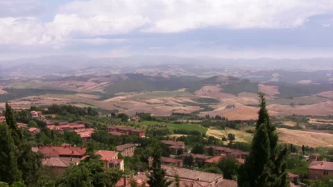 Clouds over hilly terrain 動画素材 106485866