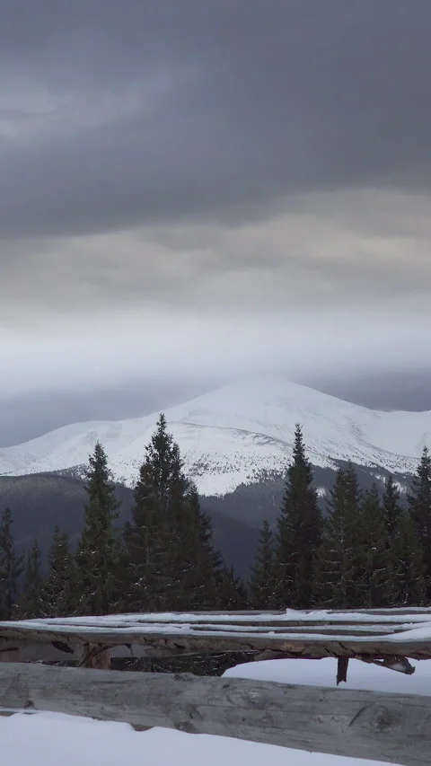 Clouds over Hoverla Mountain in winter Stock Footage 293679259