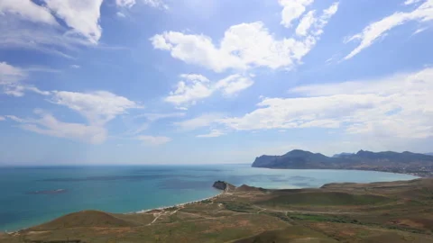 Clouds over the Karadag volcano, Cape Chameleon, Tikhaya Bay, Koktebel Bay Stock Footage 155382540