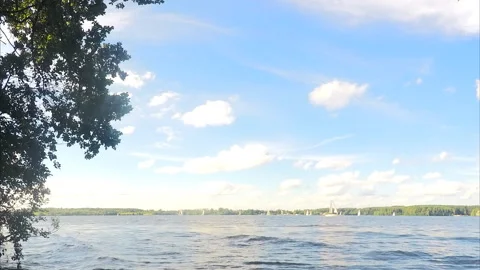 Clouds over the lake and forest timelapse Vidéo 87223057