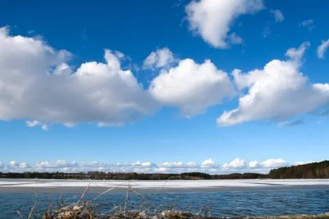 Clouds over the lake Stock Photos