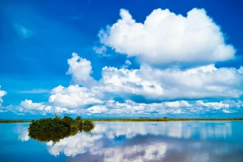 Clouds over lake Stock Photos
