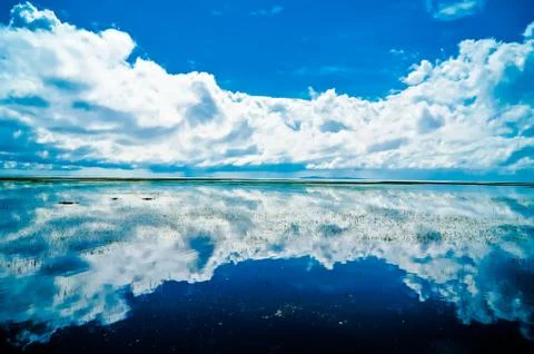 Clouds over lake Stock Photos