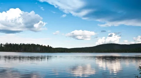 Clouds over the lake, timelapse Stock Footage 8519825