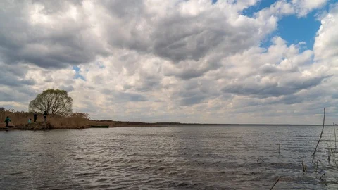 Clouds over the lake timelapse Stock Footage 107491853