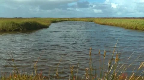 Clouds over lake, timelapse, North Sea, Germany Stock Footage 8832041