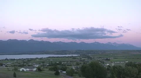 Clouds over lakeside town - time lapse by dwking Stock-Footage 11351727