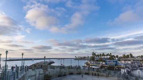 Clouds over marina with pier in foreground Stock Footage 274868653