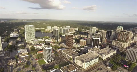 Clouds over the mid rise blocks of downtown Orlando Stock-Footage 64819414