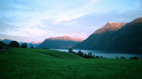 Clouds Over A Mountain and Lake Stock Footage 83851178