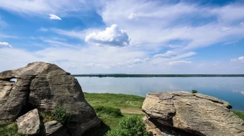 Clouds over mountain, Breathtaking view with mountains, lakes and green field Stock Footage 67475760