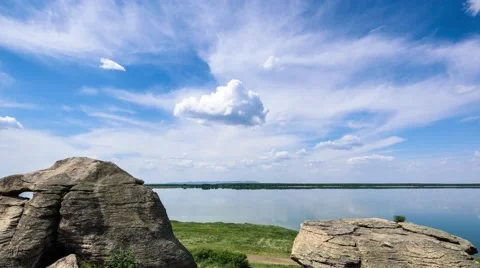 Clouds over mountain, Breathtaking view with mountains, lakes and green field Stock Footage 67475768