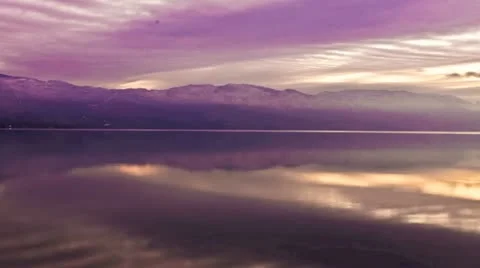 Clouds over Mountain Lake at Sunset Timelapse Stock Footage 11165527