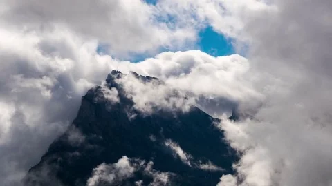 Clouds over Mountain Peak 4K Stock Footage 69826912