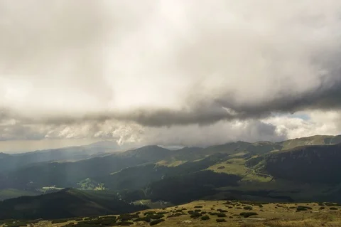 Clouds over the mountain peaks Stock Footage 95084382