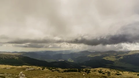 Clouds over the mountain peaks Stock Footage 95084504