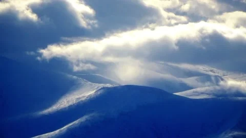 Clouds over a mountain range Video stock 131376315