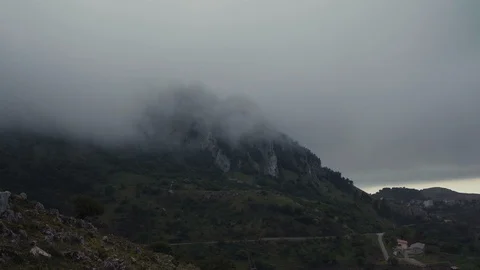 Clouds over a mountain in Sicily Stock Footage 88718386