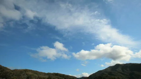 Clouds over mountain timelapse Stock Footage 446770