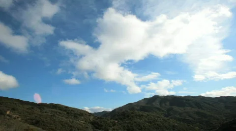 Clouds over mountain timelapse Stock Footage 447163
