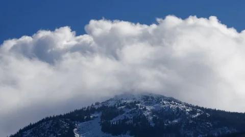 Clouds Over the Mountain Top Stock Footage 81599583
