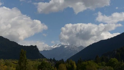Clouds over the mountain Ushba in Georgia. Timelaps Video stock 82385419