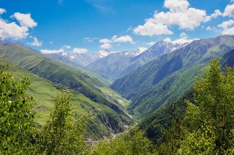 Clouds over a mountain valley. Stockfoto's
