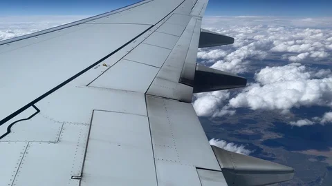 The Clouds Over the Mountains, Aerial View From Airplane Window Video stock 108814252