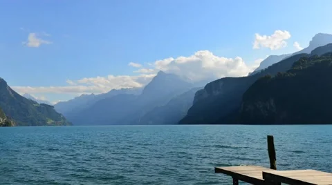 Clouds over the mountains and lake.Time Lapse Stock Footage 54447120