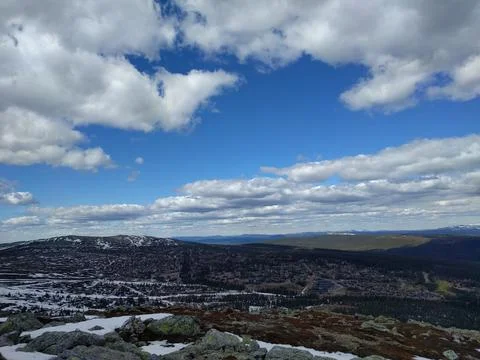 Clouds over the mountains with blue sky Stock Photos
