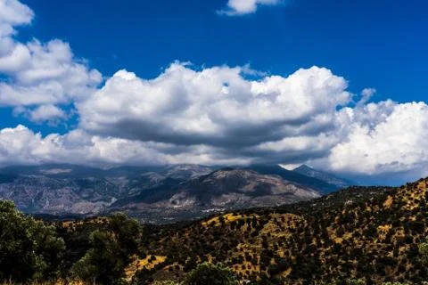 Clouds over the mountains in Crete Stock Photos