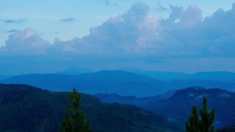 Clouds over the mountains at evening Stock Footage 300850163