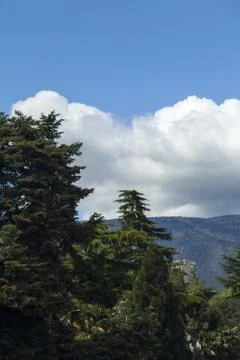 Clouds over mountains Stock Photos