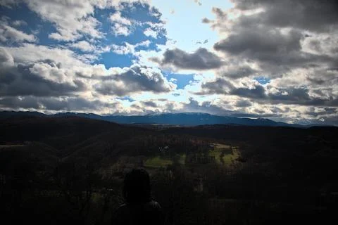 Clouds over the mountains Stock Photos
