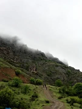 Clouds over the mountains Stock Photos
