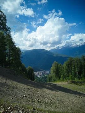 Clouds over the mountains Stock Photos