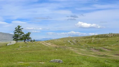 Clouds over the mountains Tavan Bogd, Mongolia. Full HD Stock Footage 72665286