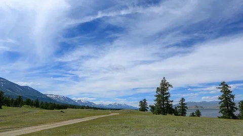 Clouds over the mountains Tavan Bogd, Mongolia.  Stock Footage 77256138