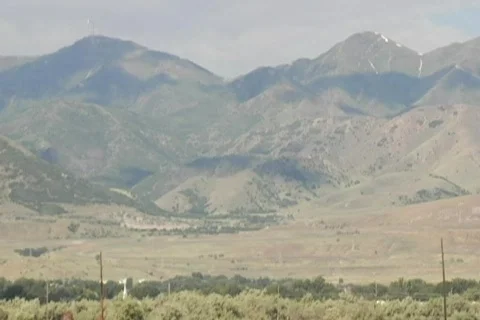 Clouds over mountains time lapse Stock Footage 522527