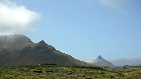 Clouds over the mountains - time lapse Stock Footage 6531768